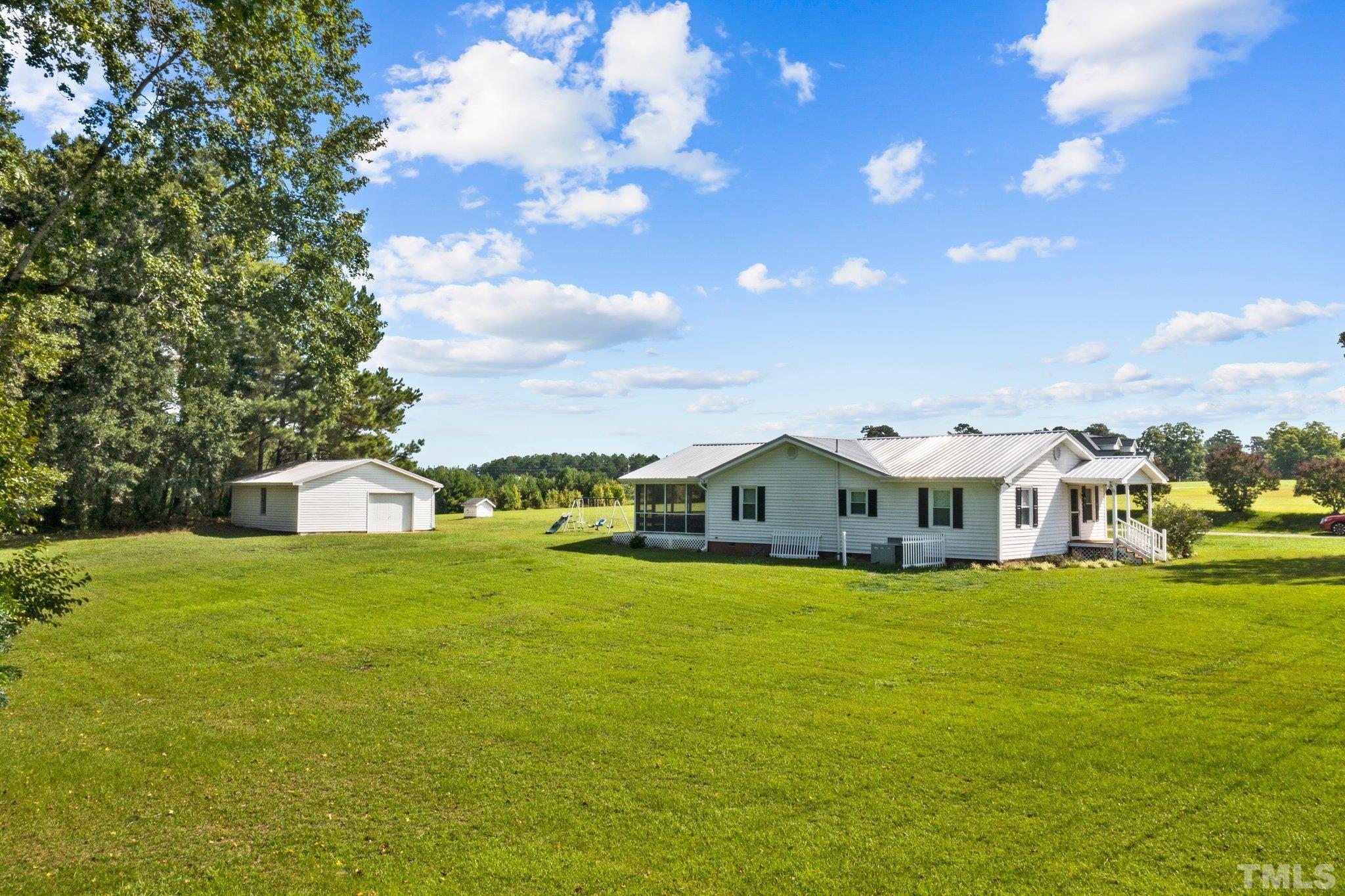 2929 Wall Store Road Garner, NC 27529 - Photo 51 of 59 a view of a house with a big yard