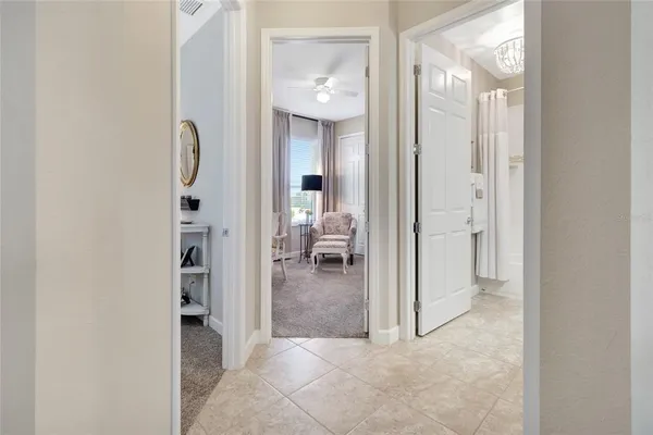 a view of a bathroom from a hallway