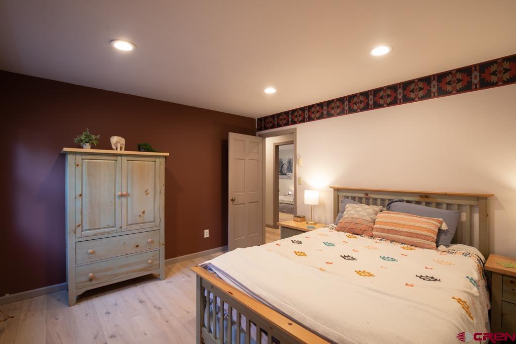 306 Hogan Circle Durango, CO 81301 - Photo 29 of 39 a bedroom with a bed and a dresser