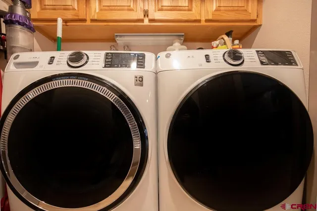 a close up view of washer and dryer