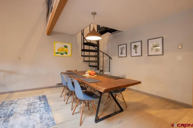 a view of a livingroom with furniture and window
