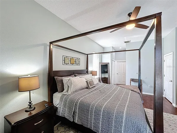 a bathroom with a tub and a sink