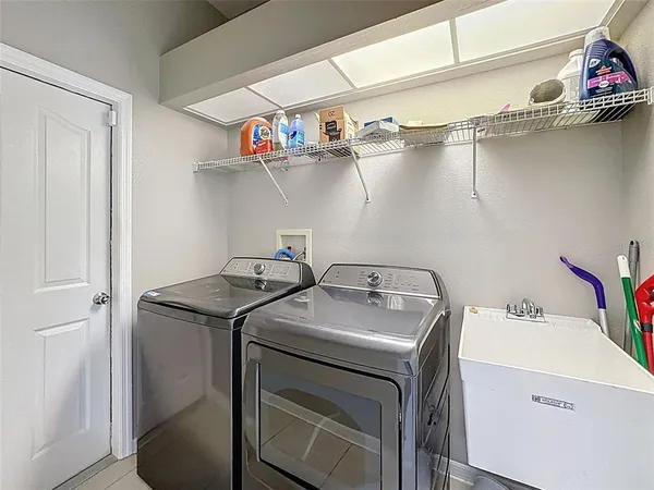 a view of swimming pool with outdoor seating