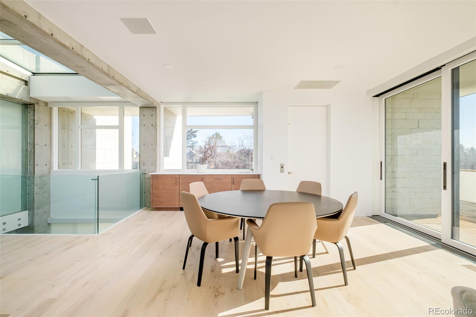 121 South Dexter Street Denver, CO 80246 - Photo 25 of 42 a view of a dining room with furniture and a window
