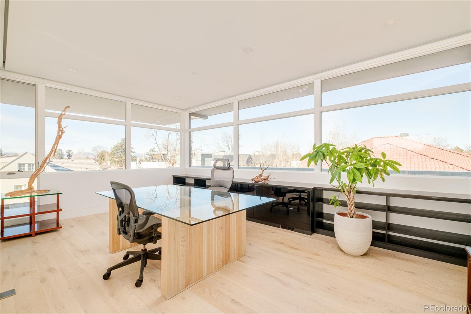 121 South Dexter Street Denver, CO 80246 - Photo 27 of 42 a dining room with furniture and a potted plant