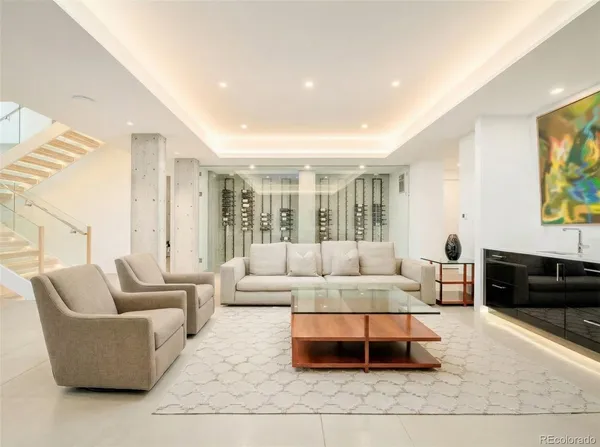 a living room with furniture and a couch