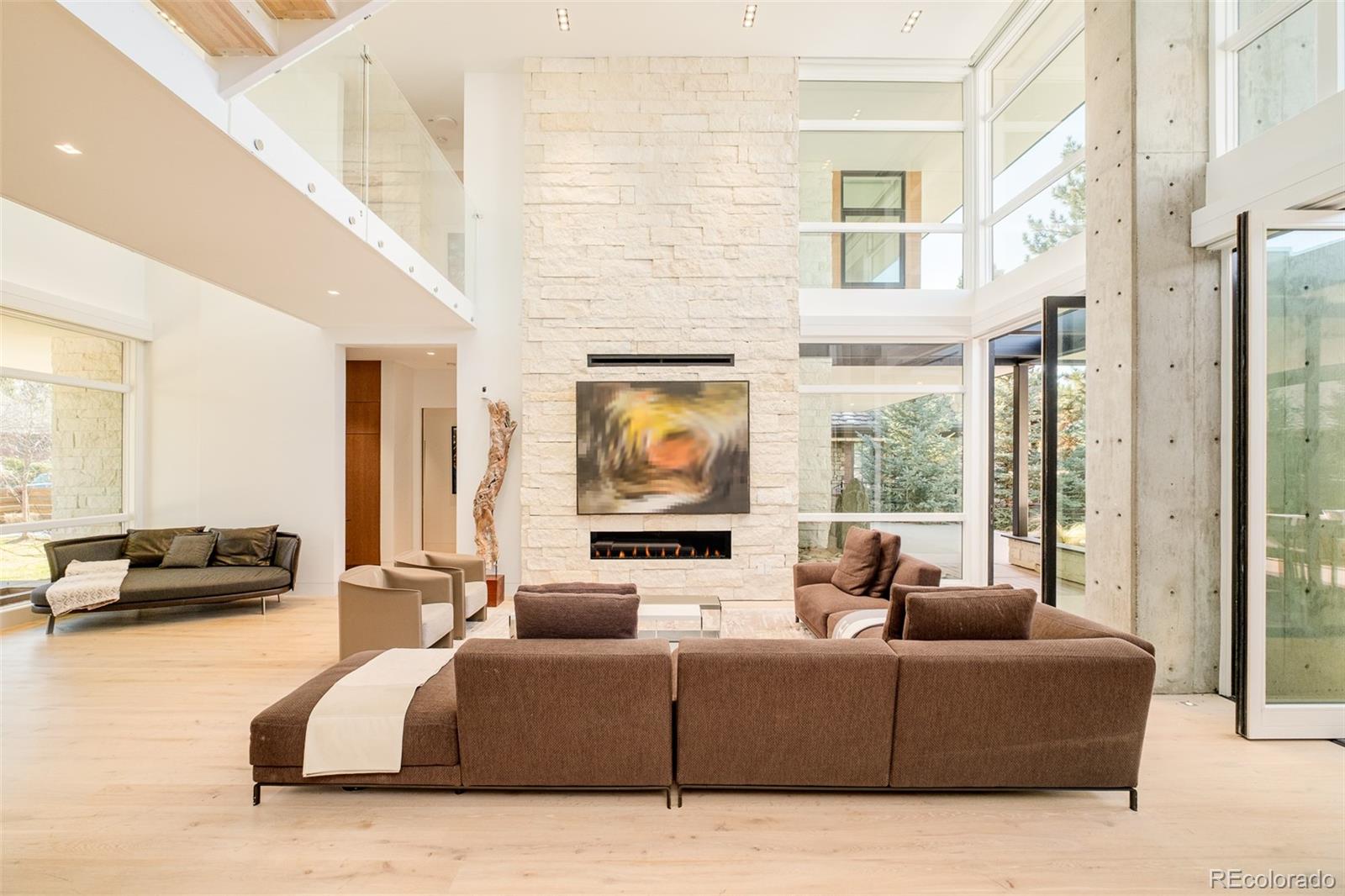 121 South Dexter Street Denver, CO 80246 - Photo 4 of 42 a living room with furniture and a flat screen tv