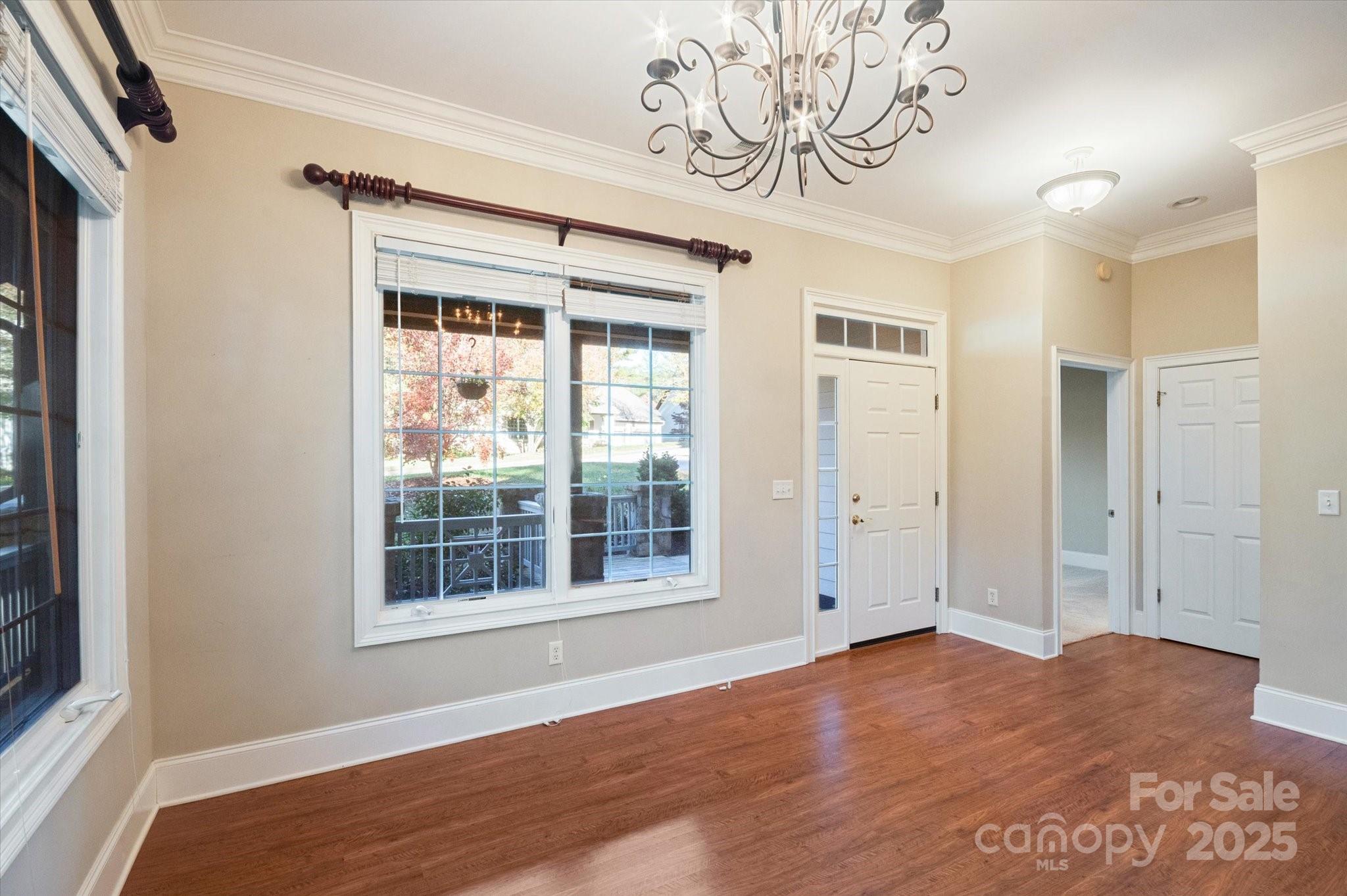 186 Camptown Road Brevard, NC 28712 - Photo 11 of 38 a view of empty room with window and wooden floor