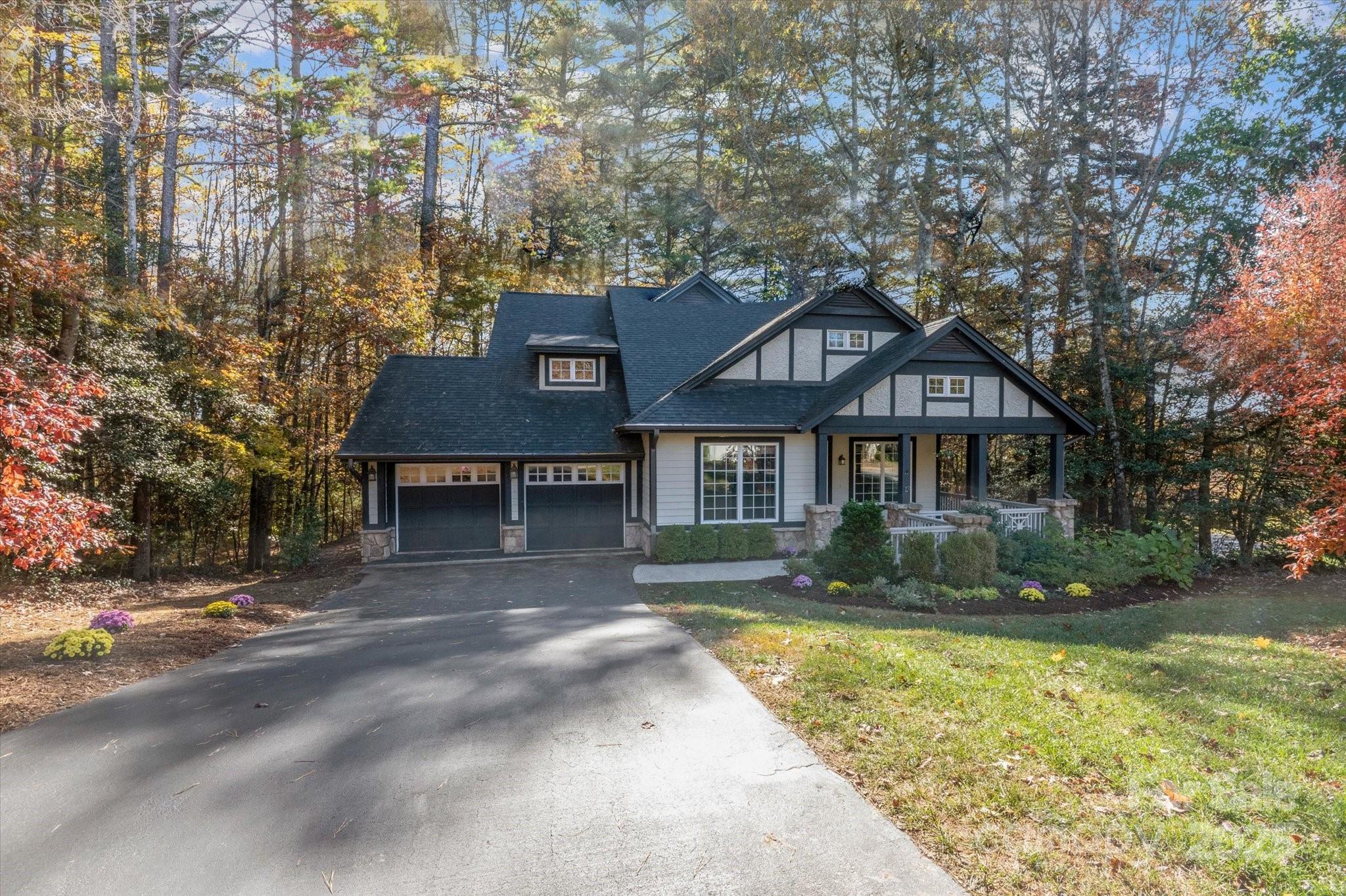 186 Camptown Road Brevard, NC 28712 - Photo 2 of 38 a front view of a house with a yard
