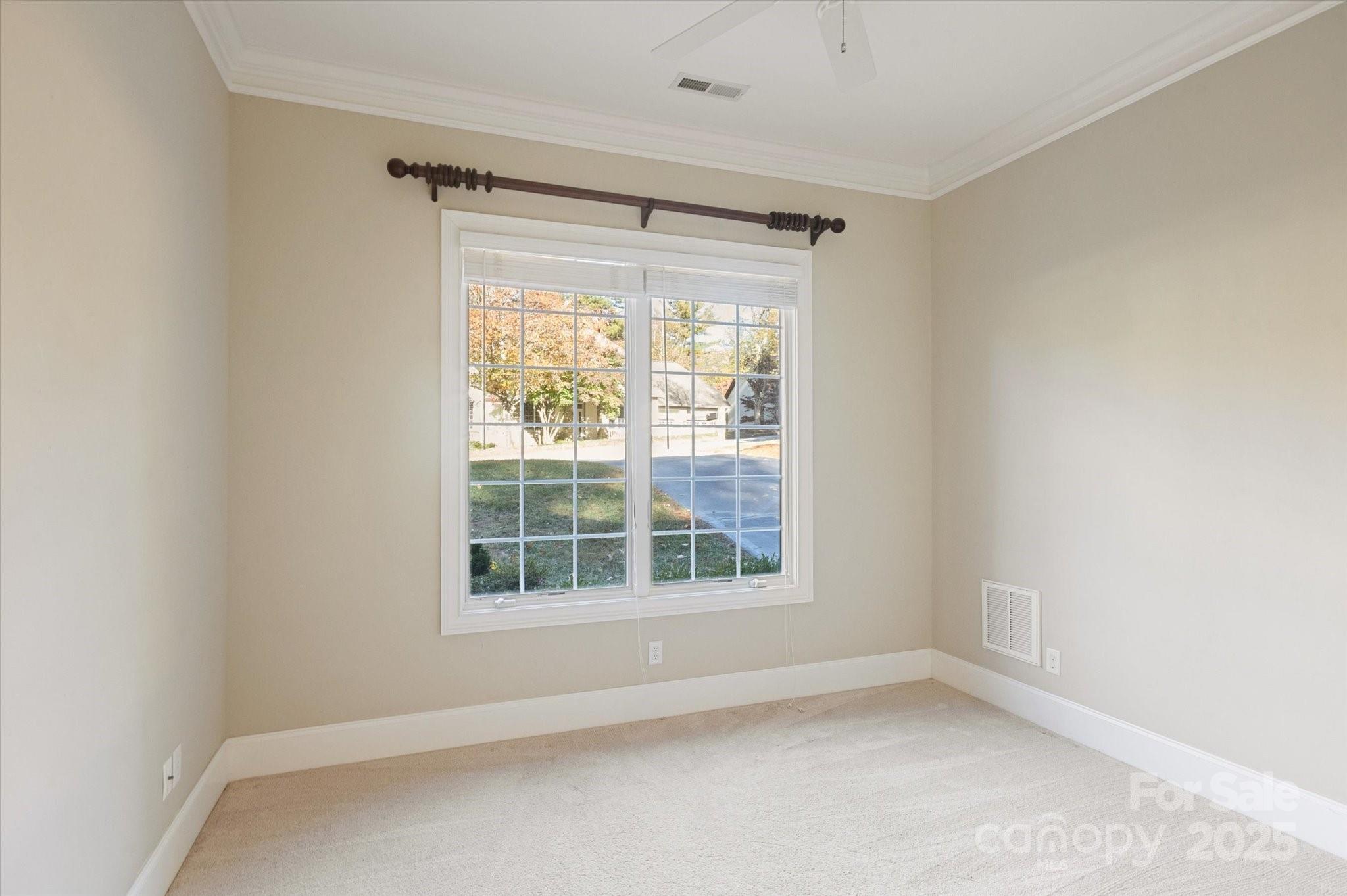 186 Camptown Road Brevard, NC 28712 - Photo 22 of 38 a view of an empty room with a window
