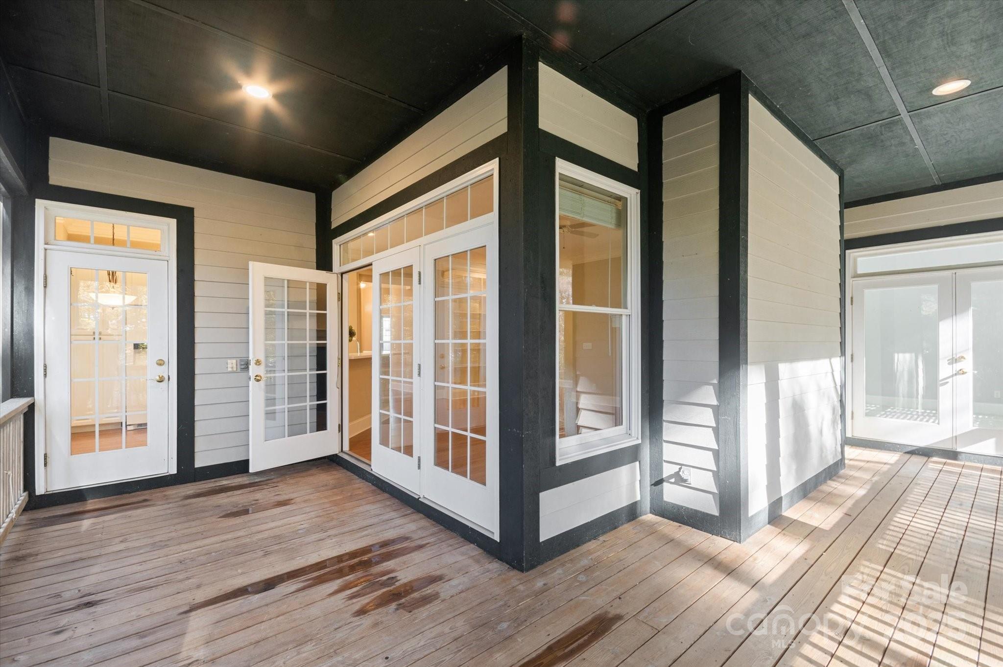 186 Camptown Road Brevard, NC 28712 - Photo 6 of 38 a view of a hallway with wooden floor and stairs