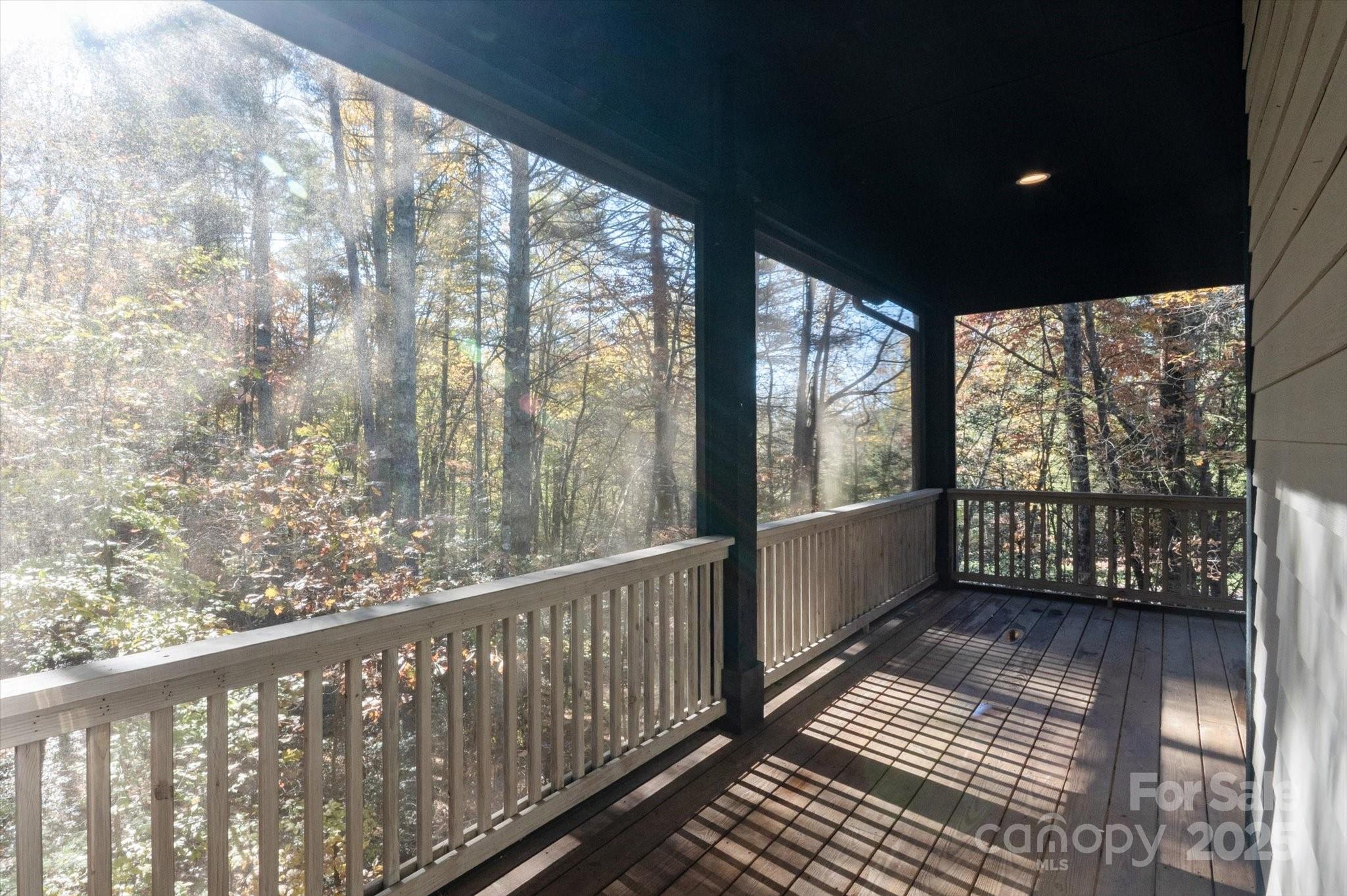 186 Camptown Road Brevard, NC 28712 - Photo 9 of 38 a view of a balcony with wooden floor