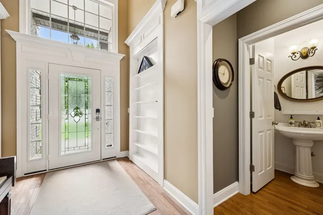 a view of a balcony with wooden floor