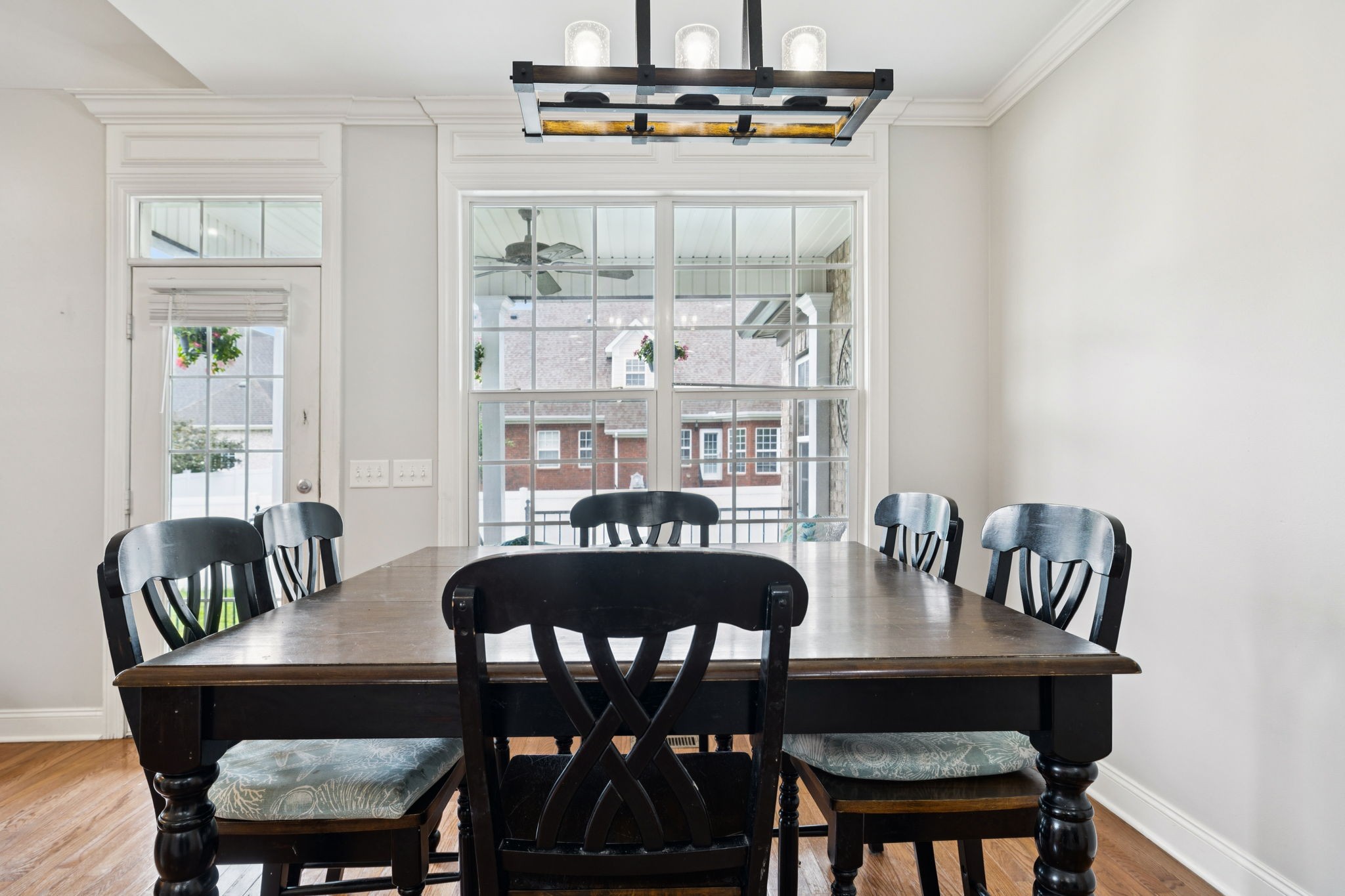 3002 Stow Crossing Murfreesboro, TN 37128 - Photo 27 of 75 a view of a dining room with furniture and wooden floor