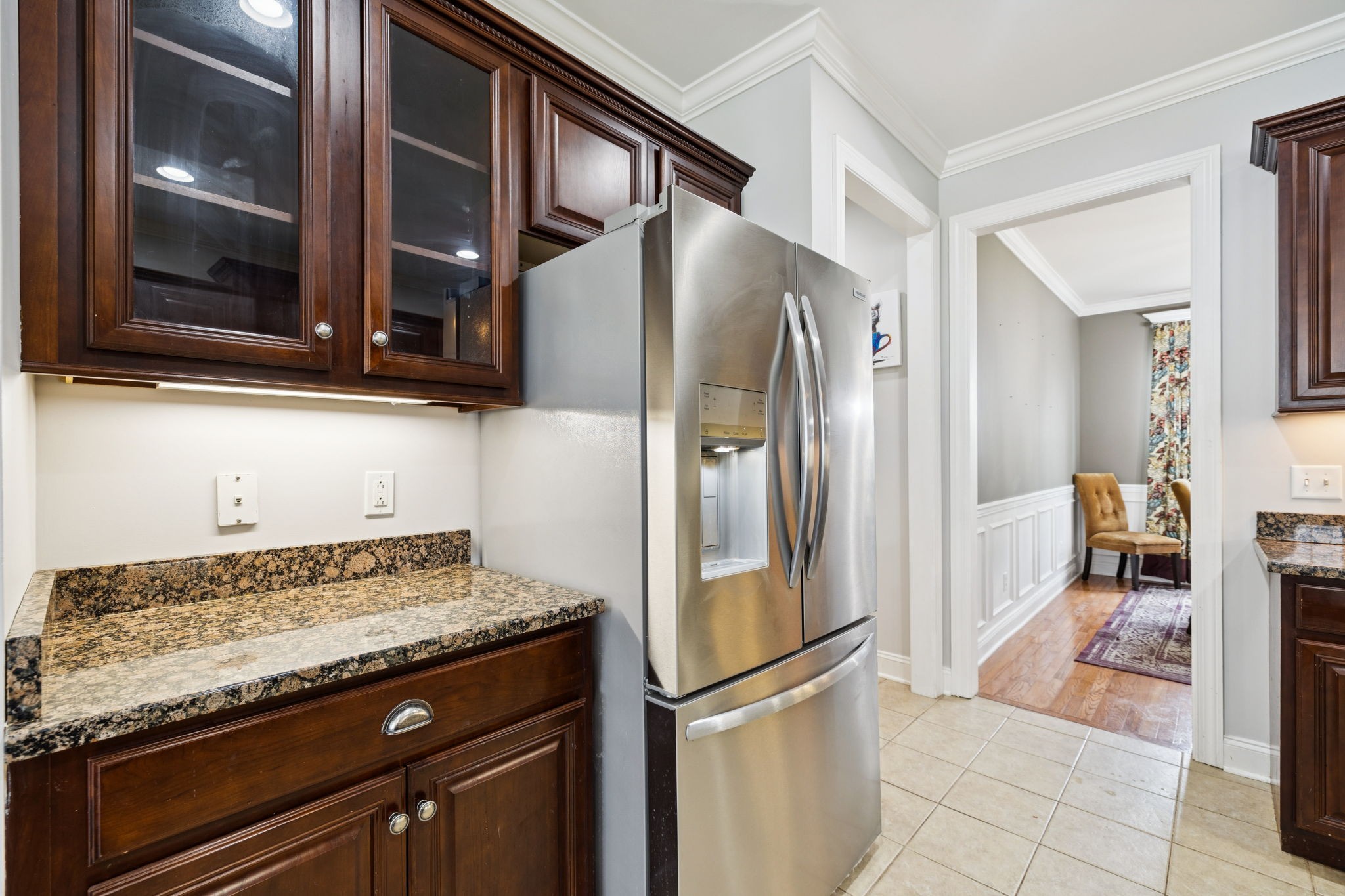 3002 Stow Crossing Murfreesboro, TN 37128 - Photo 33 of 75 a kitchen with granite countertop a refrigerator and a sink