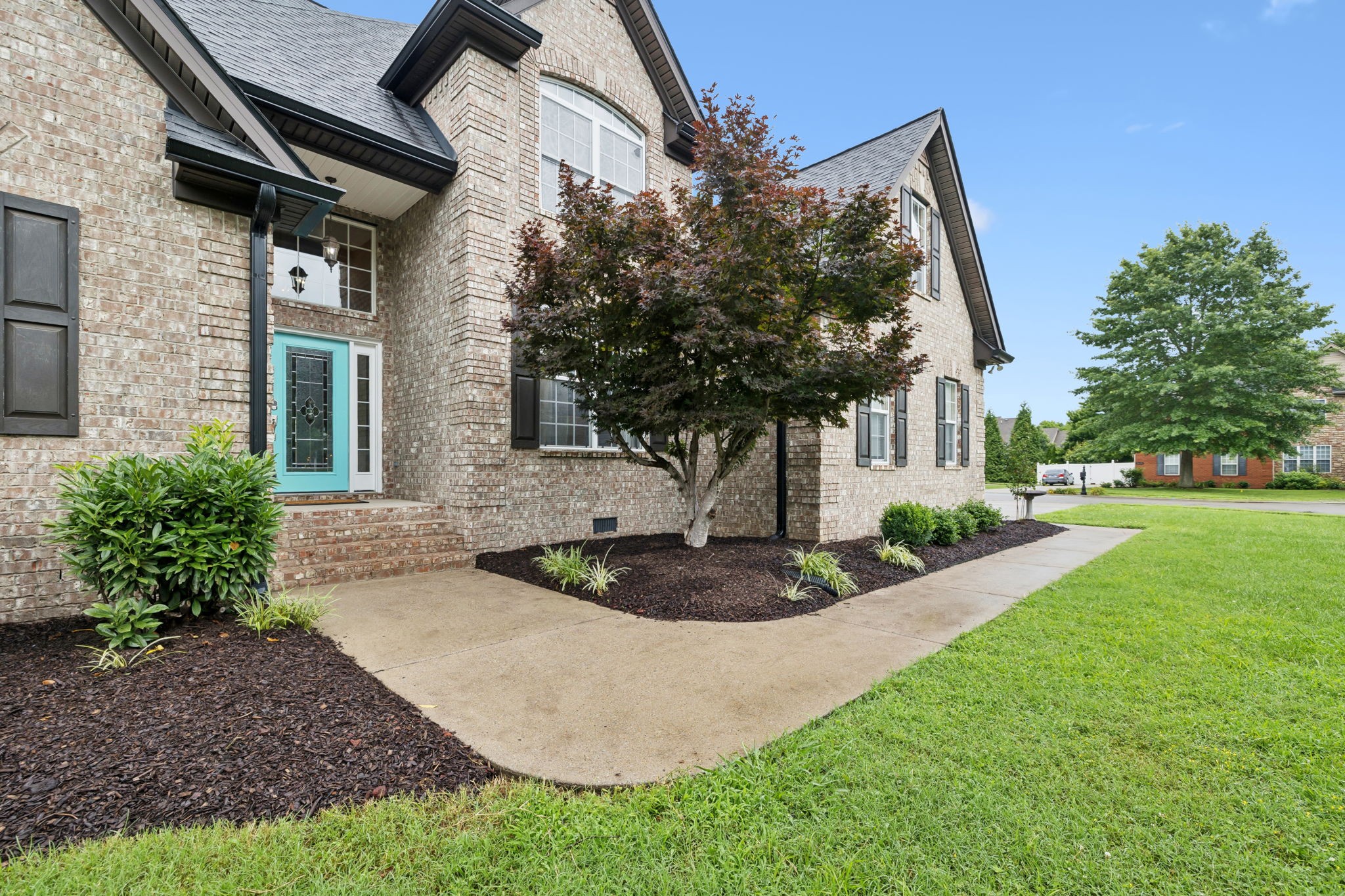 3002 Stow Crossing Murfreesboro, TN 37128 - Photo 4 of 75 a front view of a house with garden