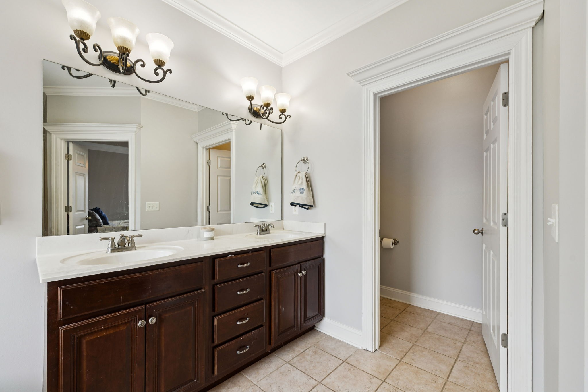 3002 Stow Crossing Murfreesboro, TN 37128 - Photo 42 of 75 a bathroom with a double vanity sink and a mirror