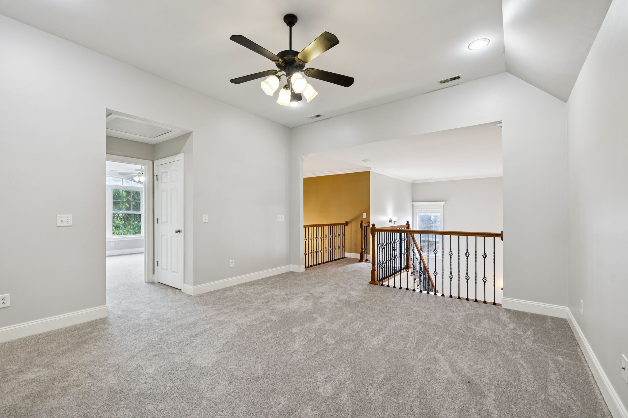 3002 Stow Crossing Murfreesboro, TN 37128 - Photo 49 of 75 an empty room with chandelier fan and windows