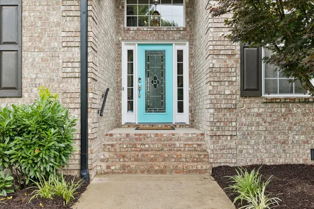 a view of a living room and a wooden floor