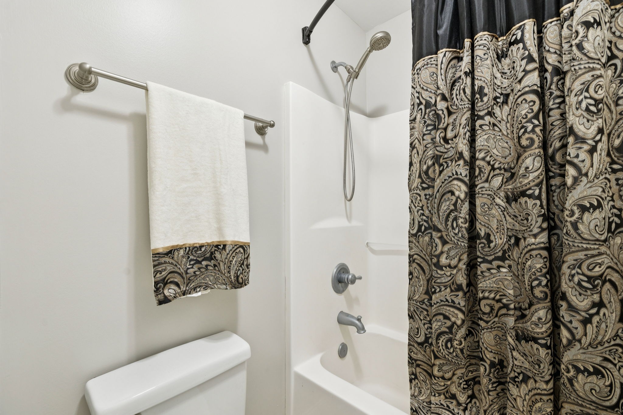 3002 Stow Crossing Murfreesboro, TN 37128 - Photo 52 of 75 a bathroom with a toilet and shower curtain