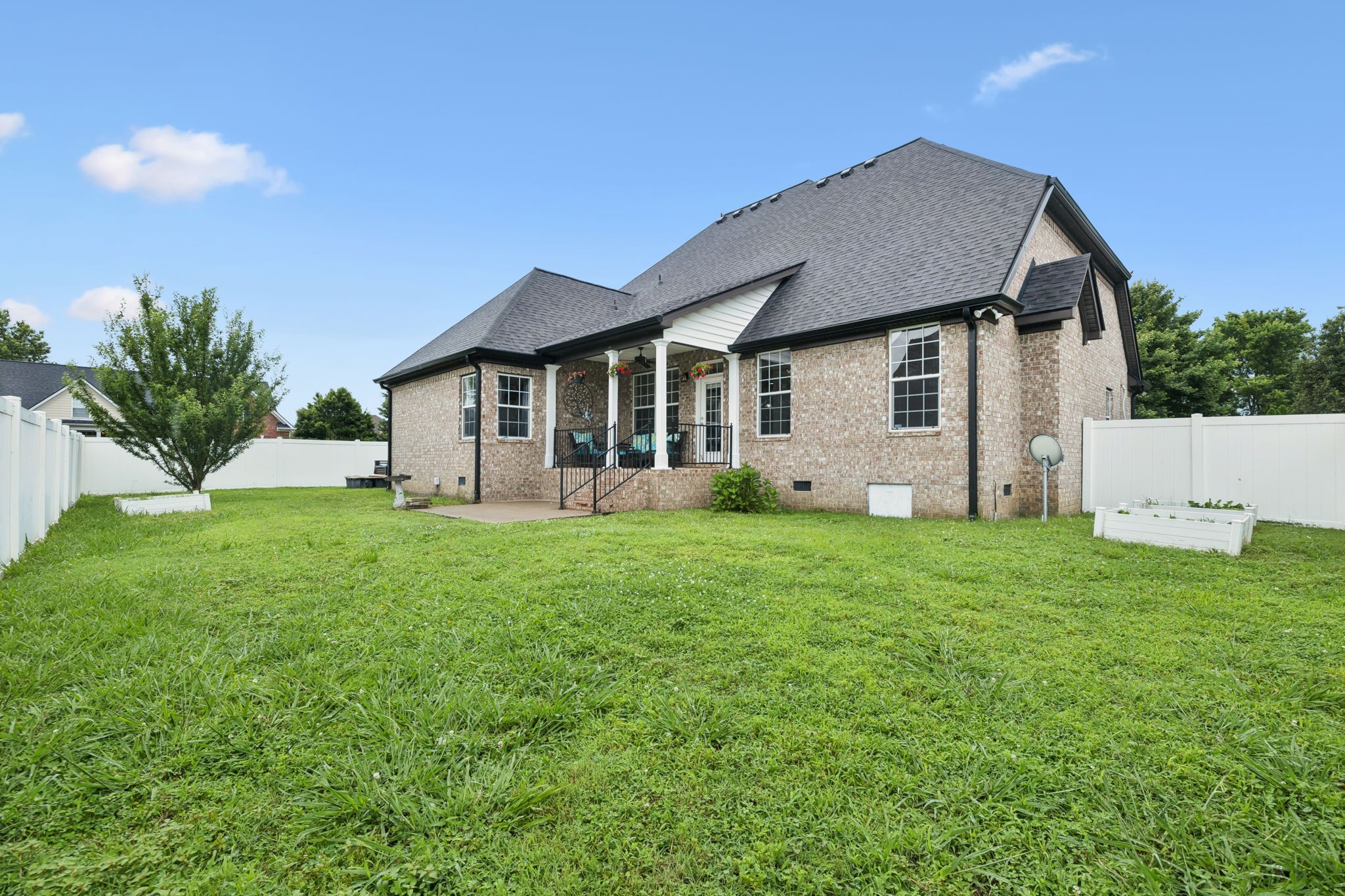 3002 Stow Crossing Murfreesboro, TN 37128 - Photo 66 of 75 a view of a house with backyard and garden