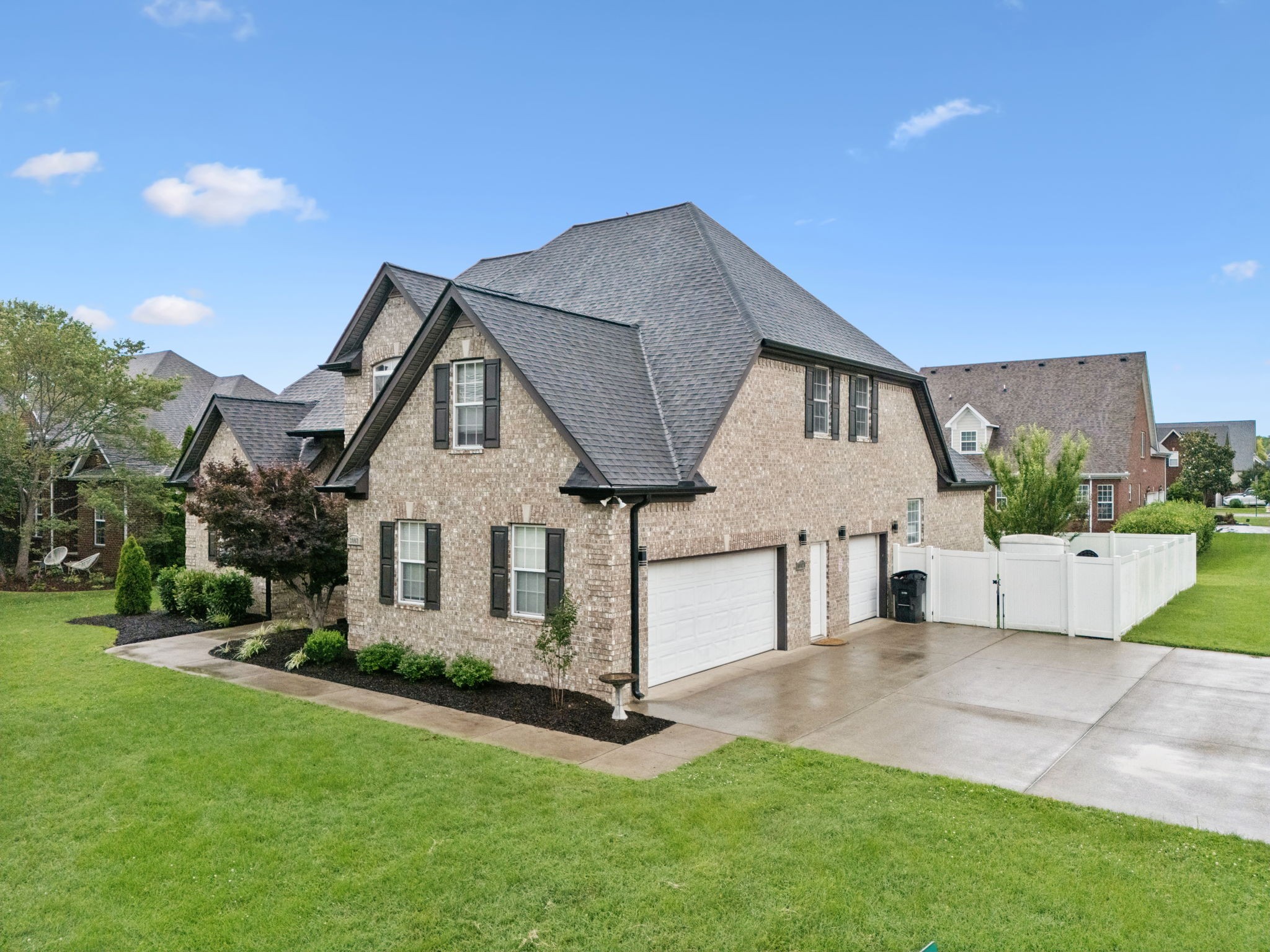 3002 Stow Crossing Murfreesboro, TN 37128 - Photo 69 of 75 a front view of a house with a yard and garage