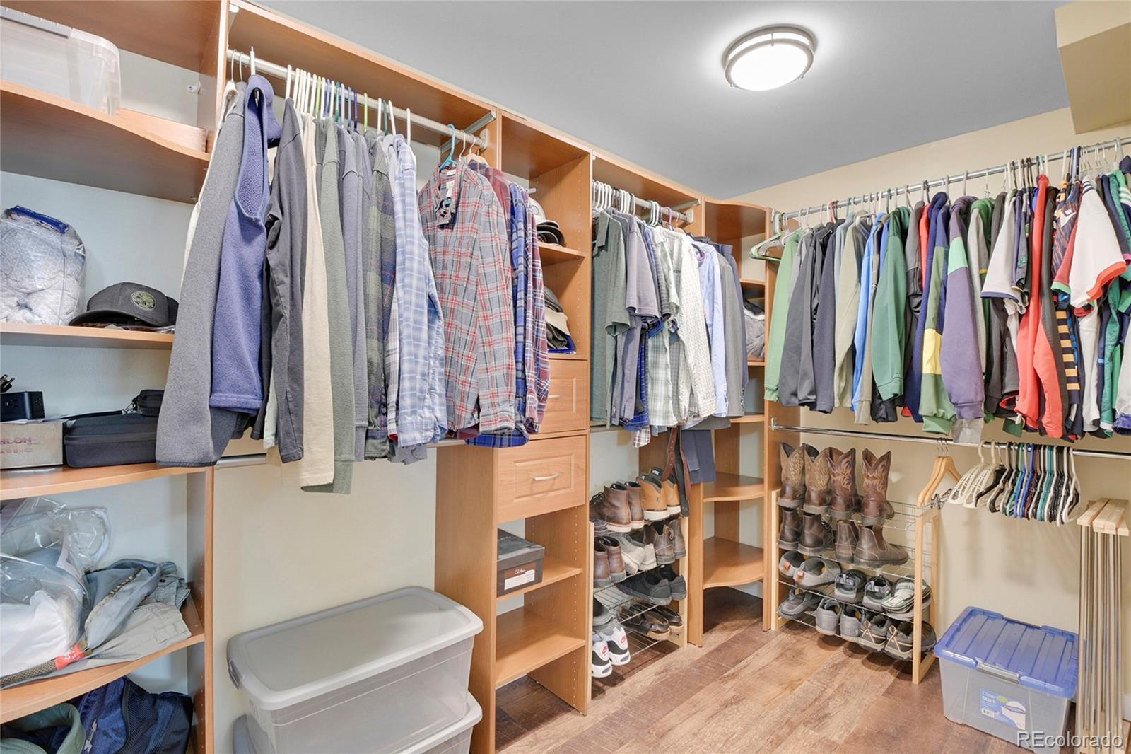 214 Conestoga Road Bailey, CO 80421 - Photo 13 of 30 a view of walk in closet with clothes and shoes