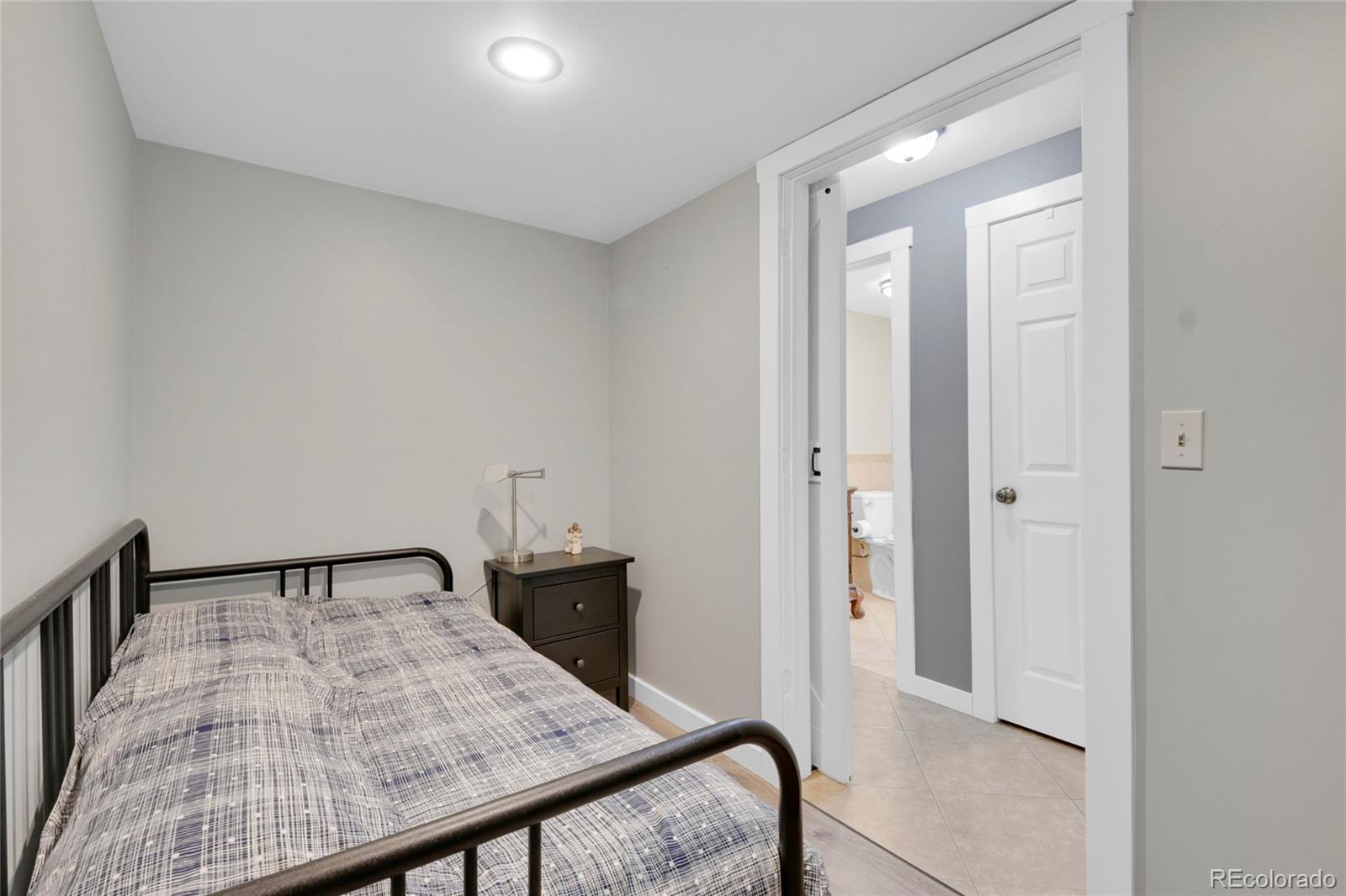 214 Conestoga Road Bailey, CO 80421 - Photo 16 of 30 a view of a bedroom and bathroom