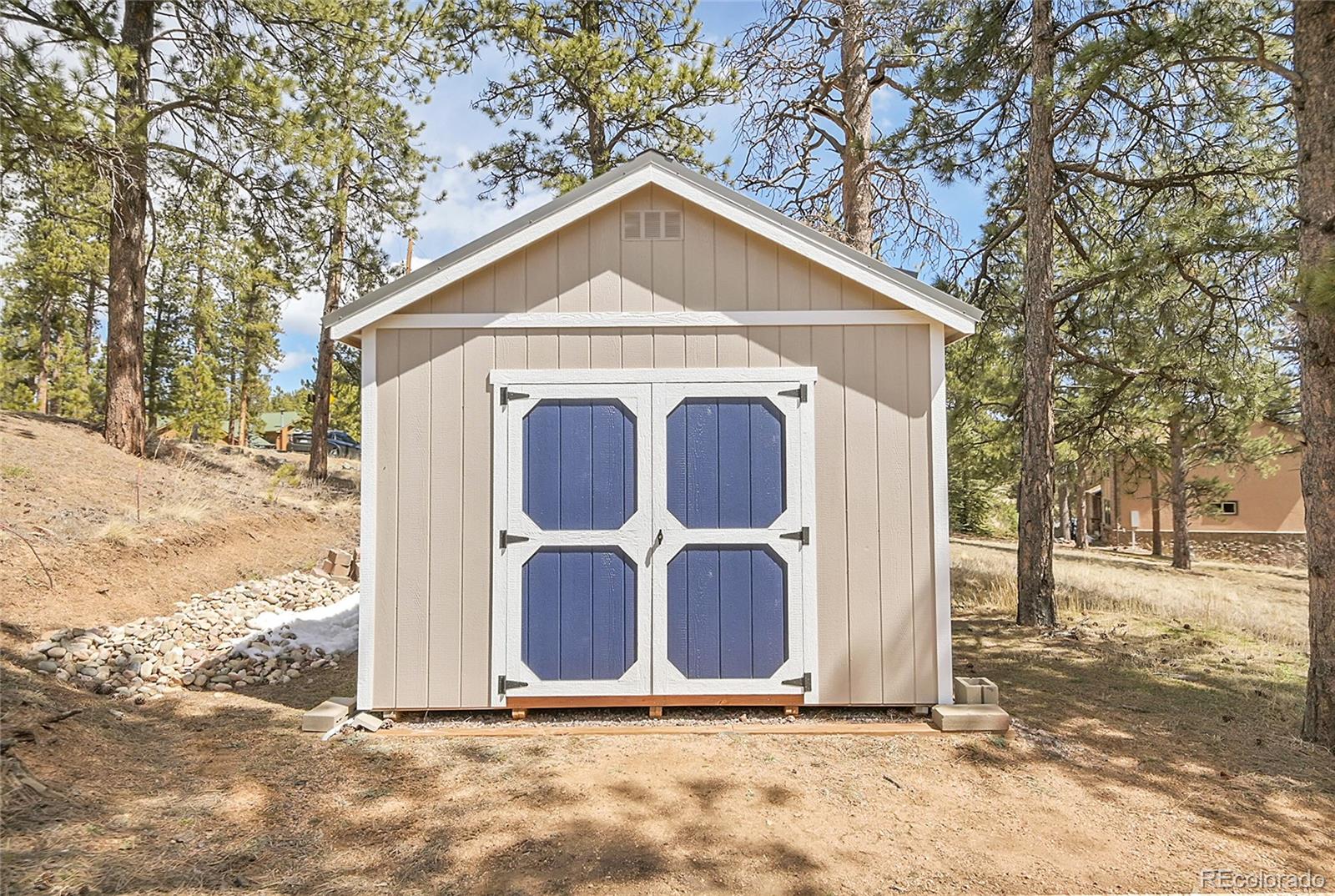 214 Conestoga Road Bailey, CO 80421 - Photo 25 of 30 a view of entrance gate of house
