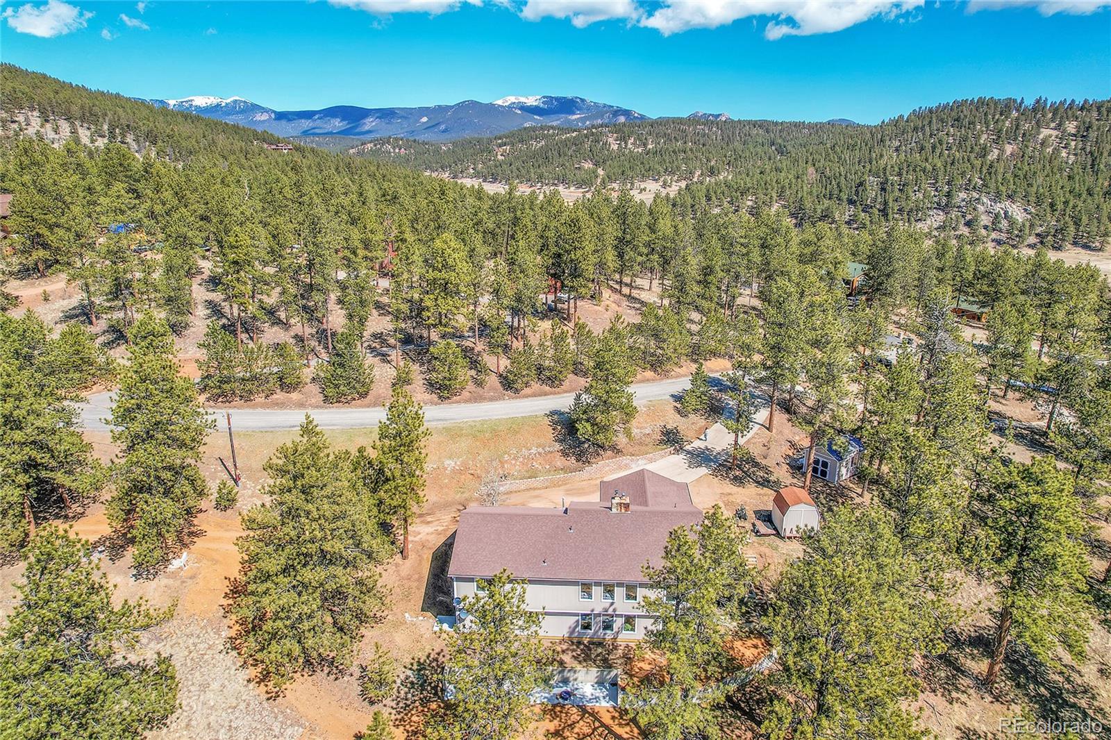 214 Conestoga Road Bailey, CO 80421 - Photo 26 of 30 an aerial view of residential houses with outdoor space and trees