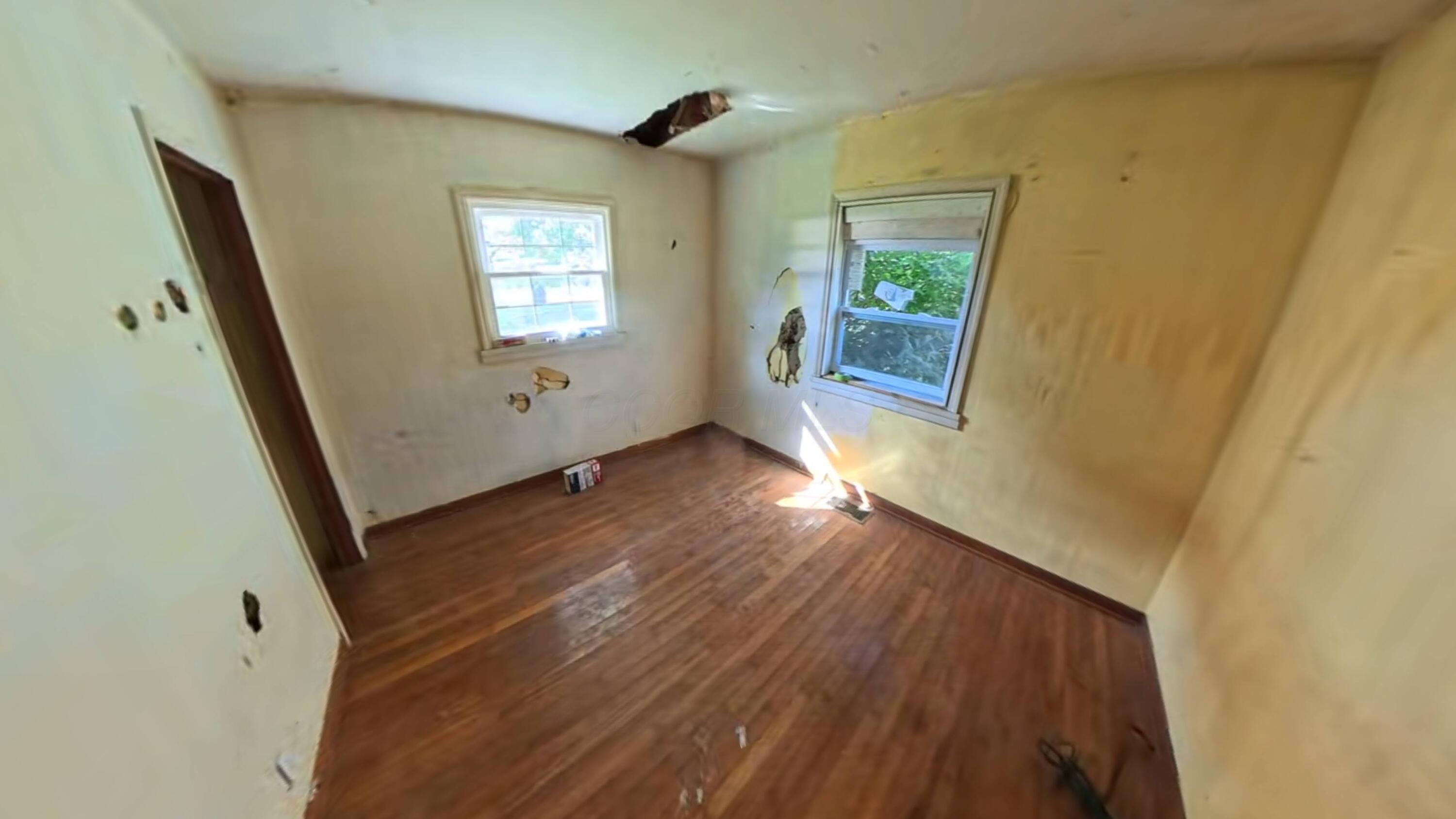 6045 Refugee Road Pickerington, OH 43147 - Photo 16 of 28 16 Bedroom 3 with hardwood floors, walls