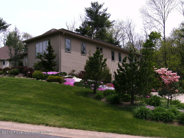 4 Fern Ridge Court Shavertown, PA 18708 - Photo 3 of 57 a view of a house with a big yard and potted plants