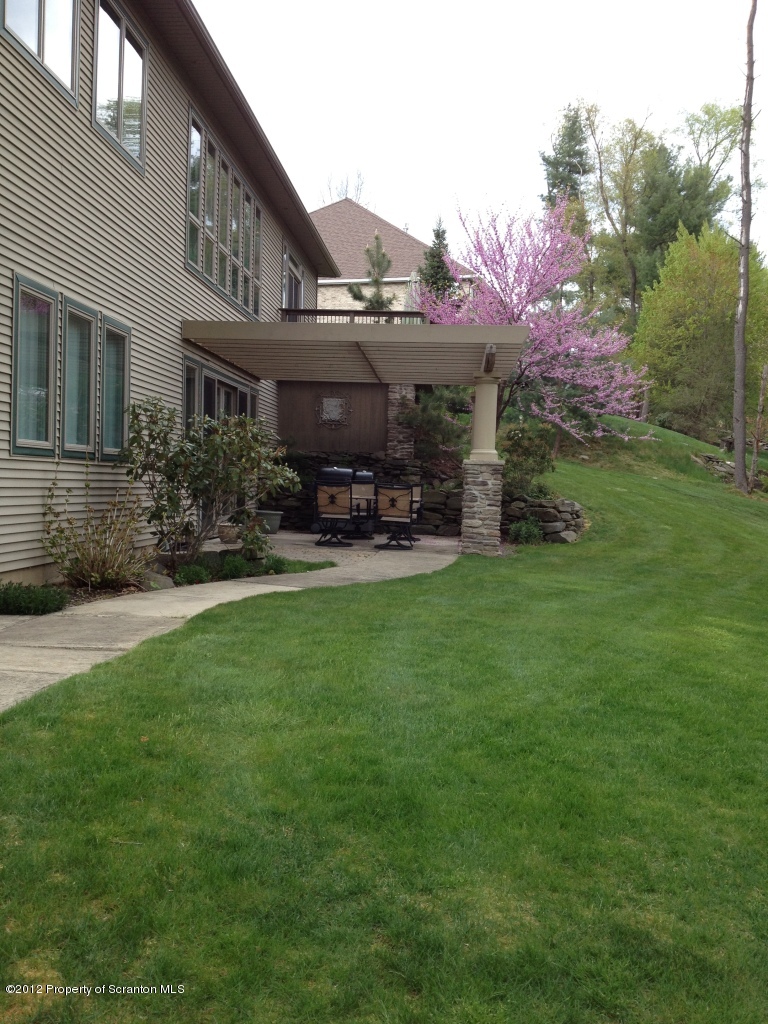 4 Fern Ridge Court Shavertown, PA 18708 - Photo 5 of 57 a view of a house with a yard porch and sitting area