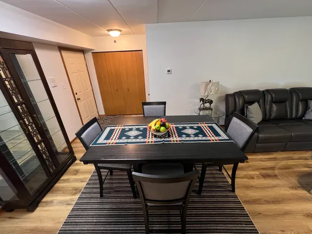a view of a dining room with furniture