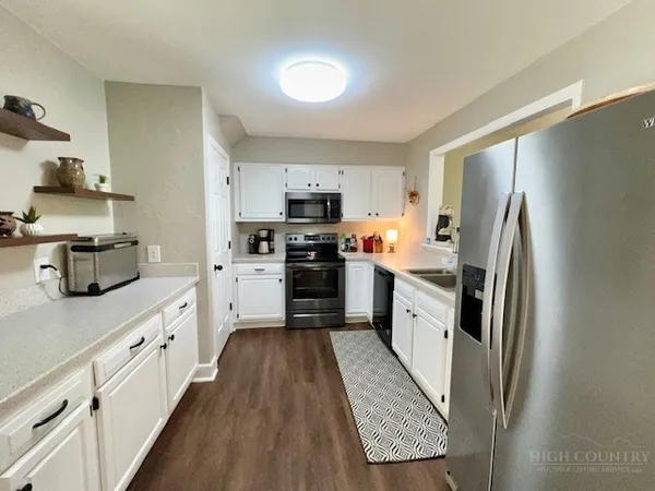 $374,000 | 57 Club Villa Drive, Unit 104, Thurmond, NC 28683