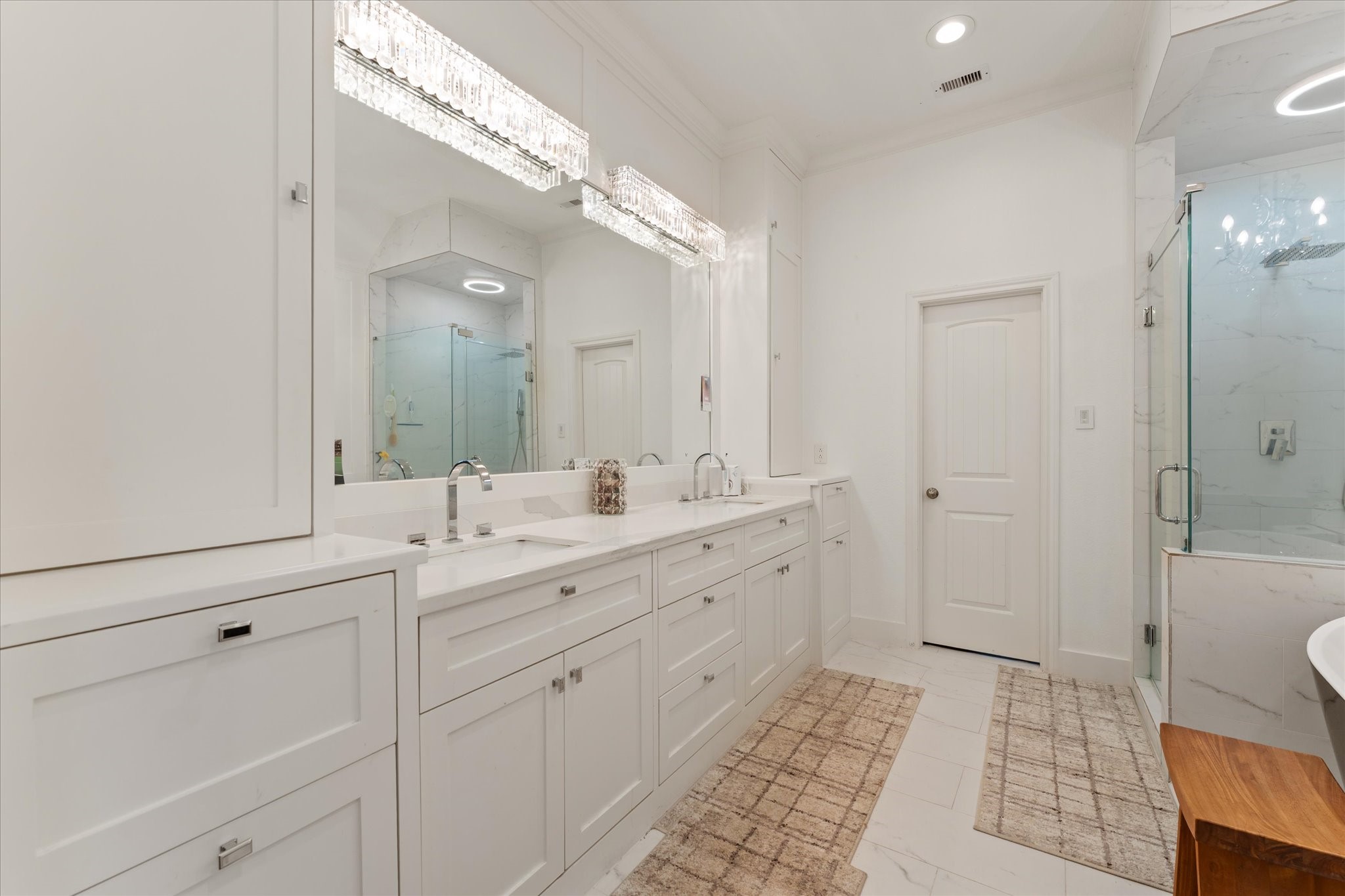 1706 Elmside Court Conroe, TX 77301 - Photo 23 of 37 Elegant and timeless. Great view of this bathroom and spacious cabinetry complimented by the Carrera tilework.