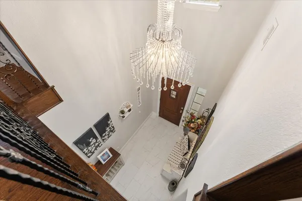 a view of balcony with furniture