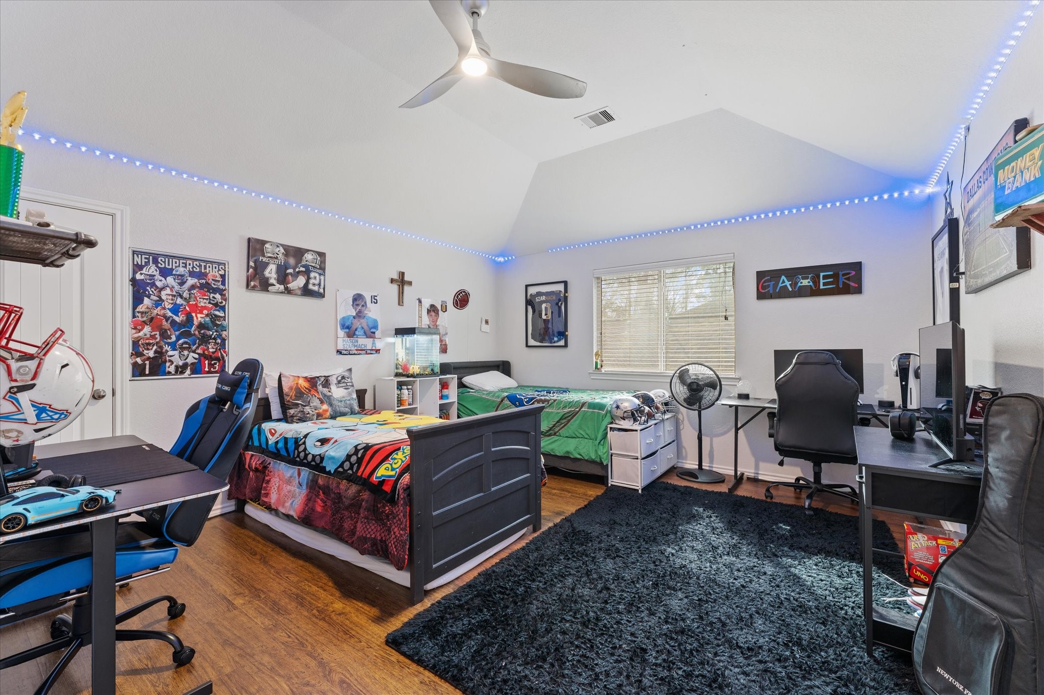 1706 Elmside Court Conroe, TX 77301 - Photo 27 of 37 This ample bedroom measures 14'7" x 13'10" and features a vaulted style ceiling.