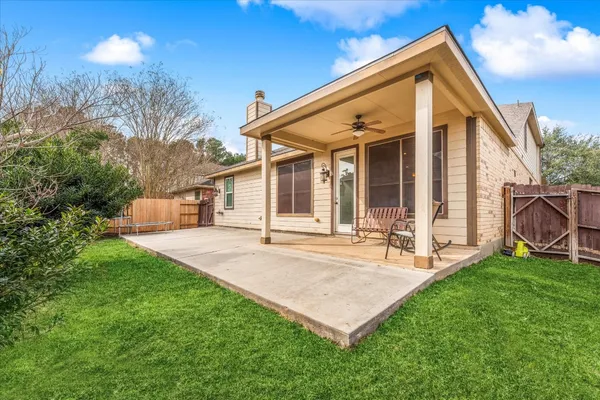 a front view of a house with a yard and porch