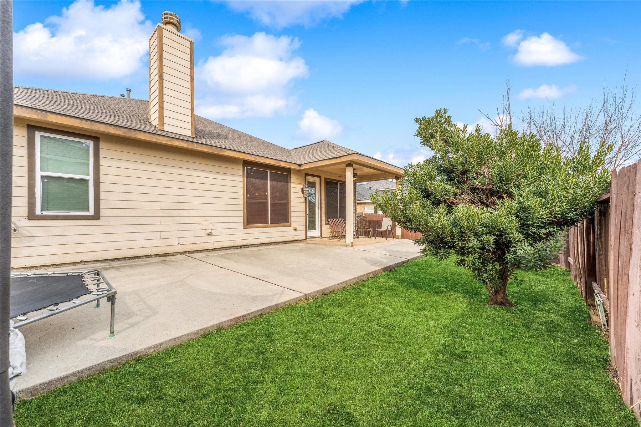 1706 Elmside Court Conroe, TX 77301 - Photo 35 of 36 a front view of a house with garden