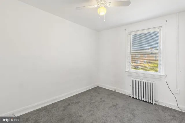 an empty room with a bathroom