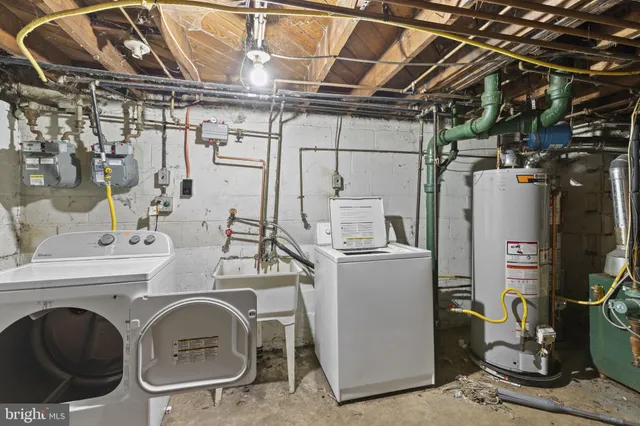 a view of a brick house with a yard