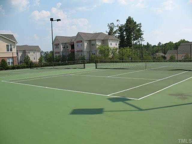 2511 Friedland Place, Unit 200 Raleigh, NC 27617 - Photo 10 of 12 a view of a tennis court