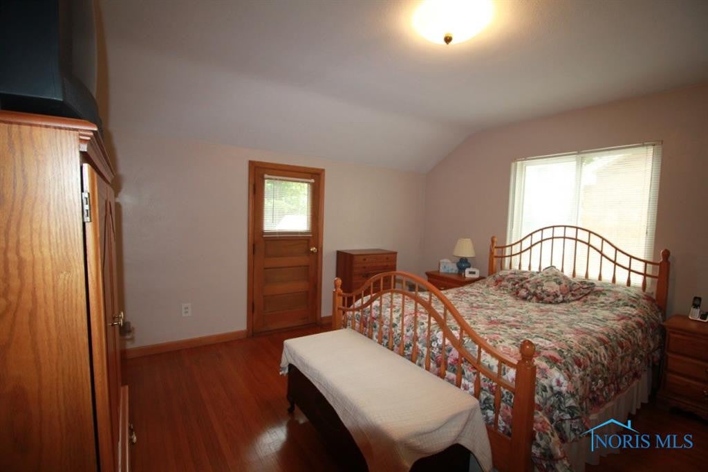 3128 Aldringham Road Toledo, OH 43606 - Photo 19 of 35 Hardwood floors shine here! Rear door exits to airing deck.