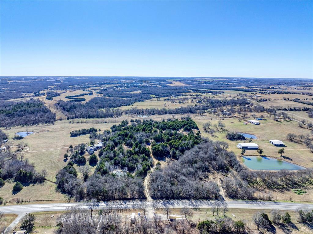 4292 Highway 56 Bells, TX 75414 - Photo 5 of 23 a view of a city