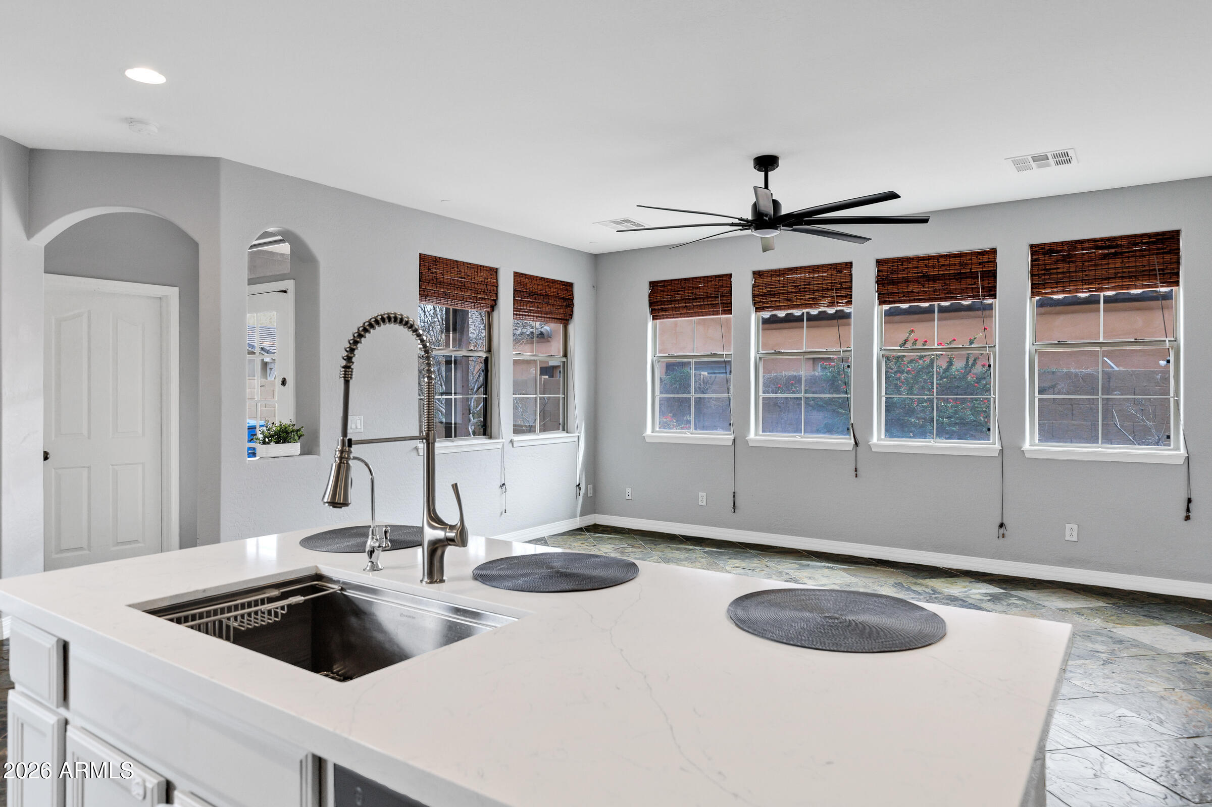 20982 West Edith Way Buckeye, AZ 85396 - Photo 16 of 57 a view of a kitchen counter space and windows