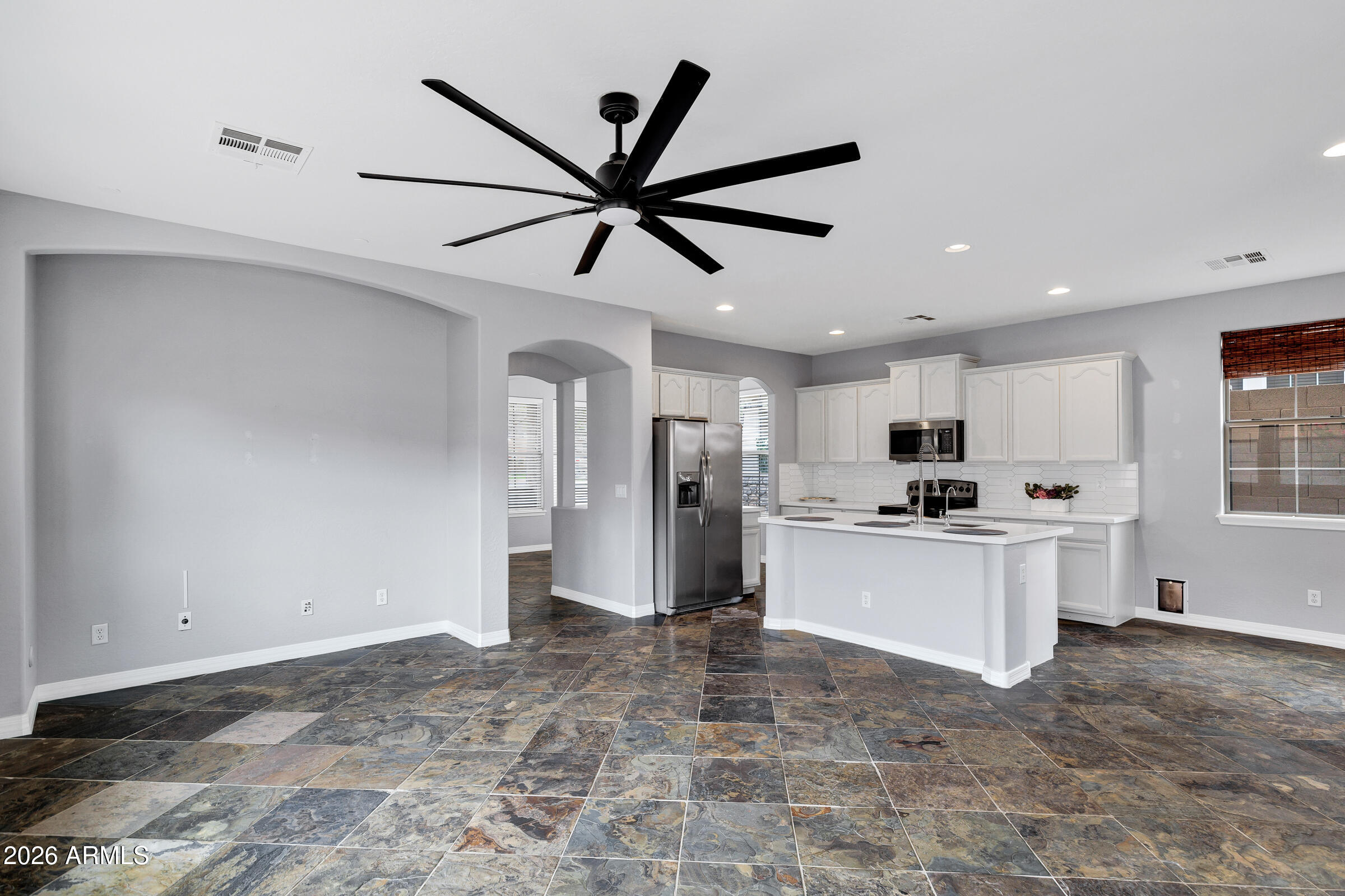 20982 West Edith Way Buckeye, AZ 85396 - Photo 17 of 57 a view of living room with furniture and ceiling fan