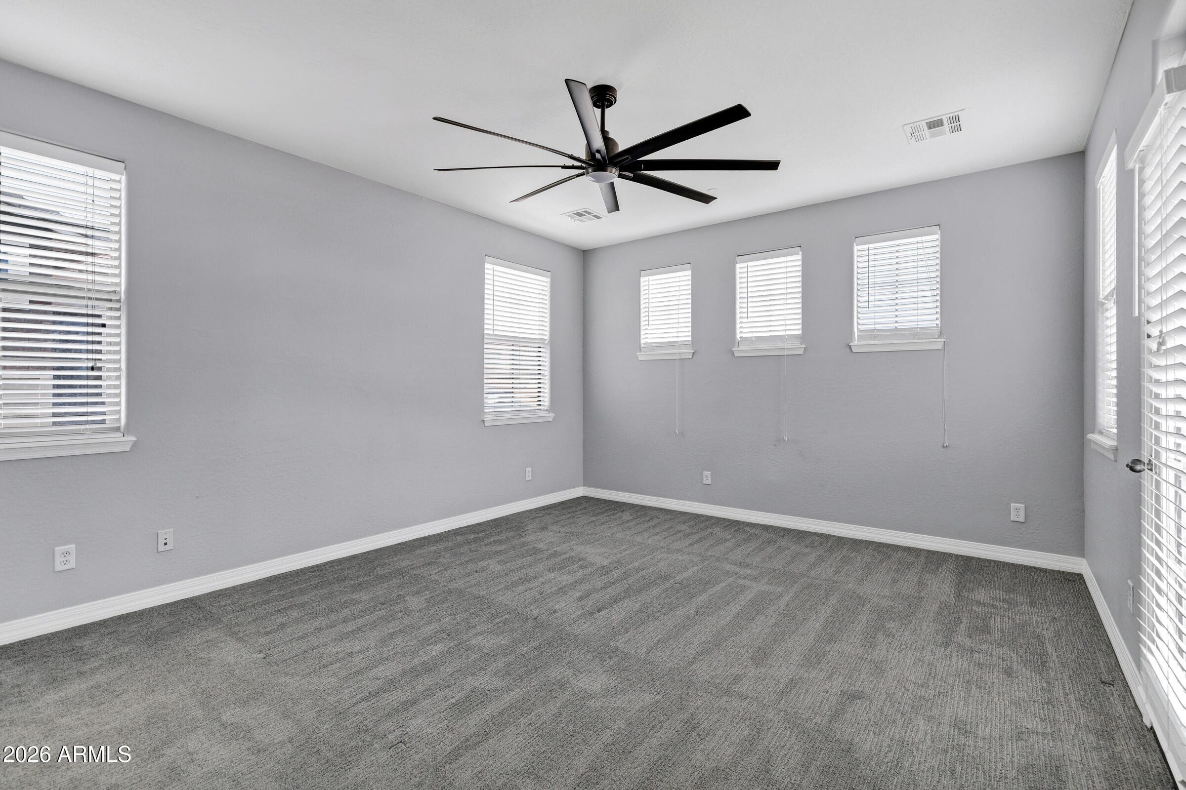 20982 West Edith Way Buckeye, AZ 85396 - Photo 32 of 57 a view of an empty room with a window