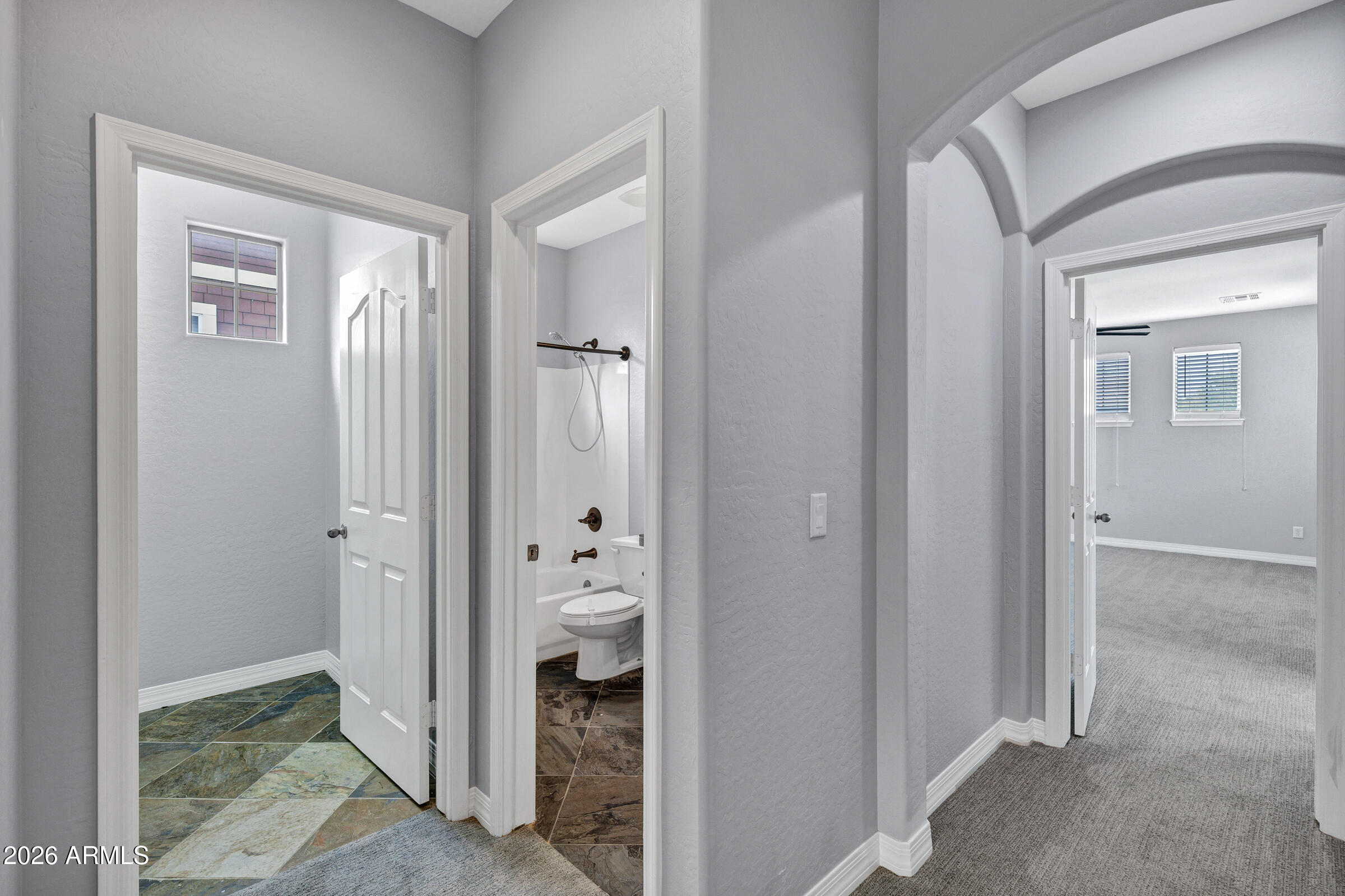 20982 West Edith Way Buckeye, AZ 85396 - Photo 40 of 57 a view of a bathroom with a sink and toilet