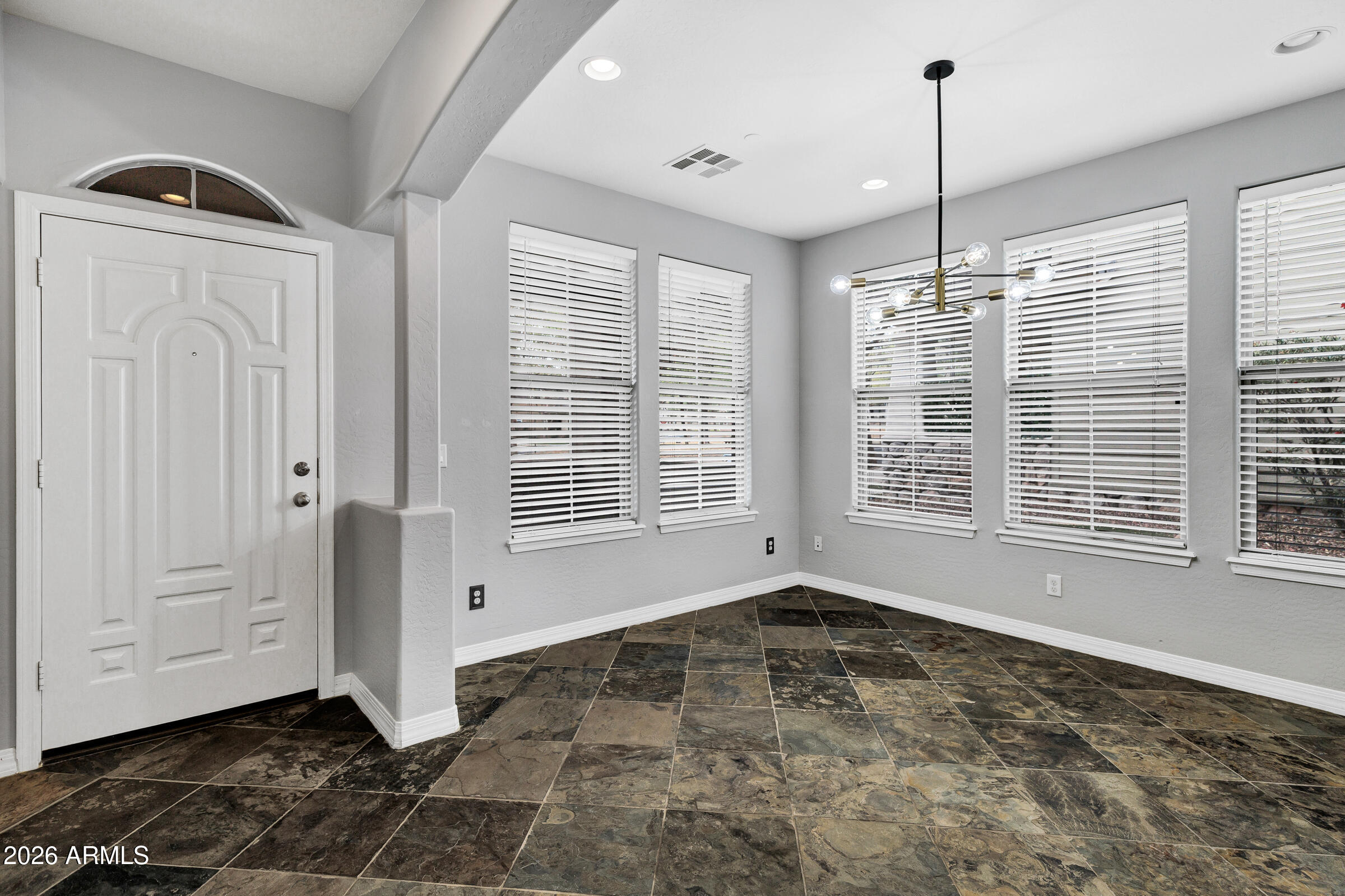 20982 West Edith Way Buckeye, AZ 85396 - Photo 7 of 57 a view of an empty room with a window
